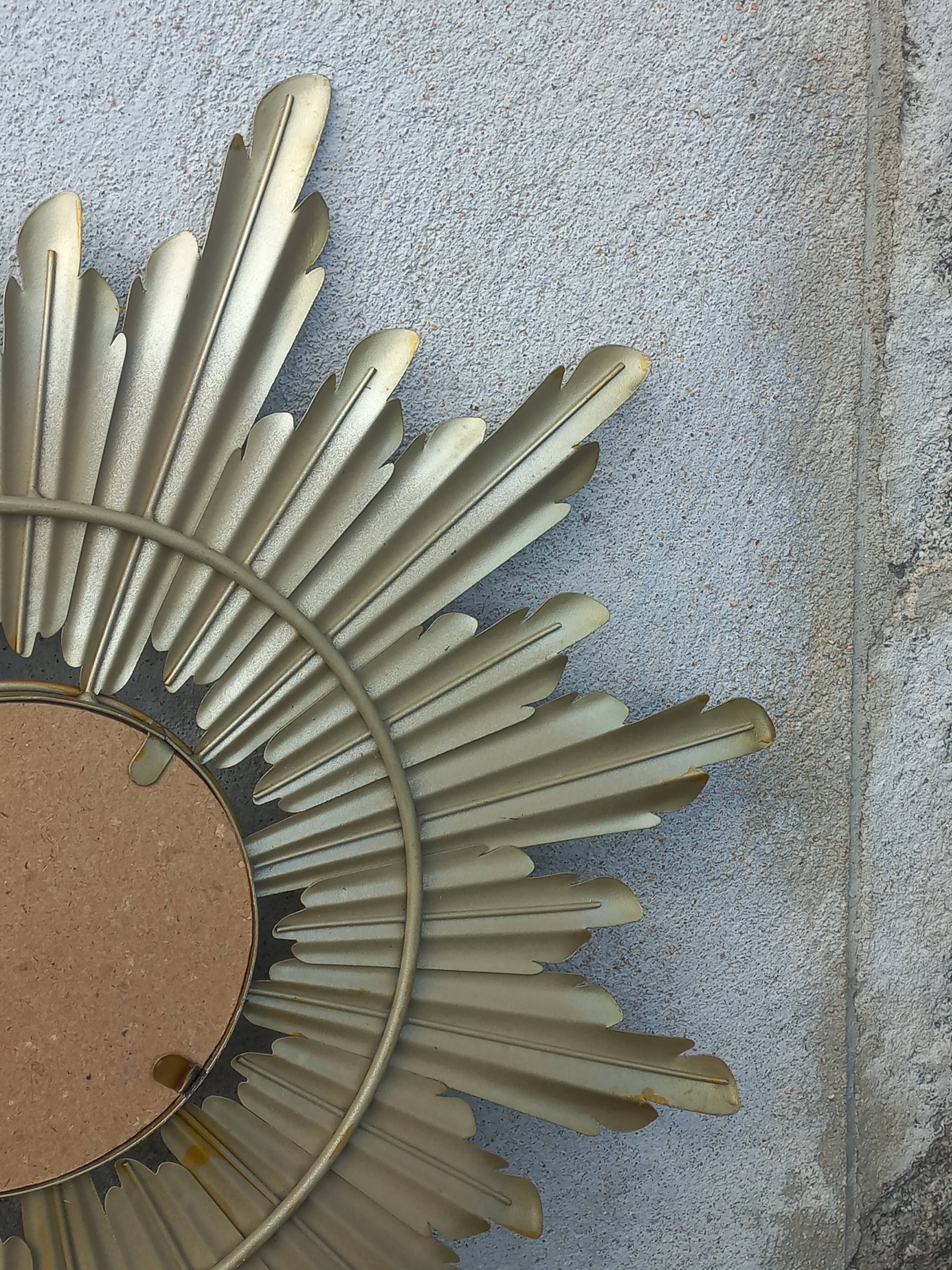 Gold metal sun mirror