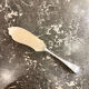 Pie shovel, silver metal, ribbon model