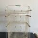 Metal serving trolley on wheels