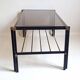 Magazine holder coffee table 1960s smoked glass, metal and brass Width 94.2 cm