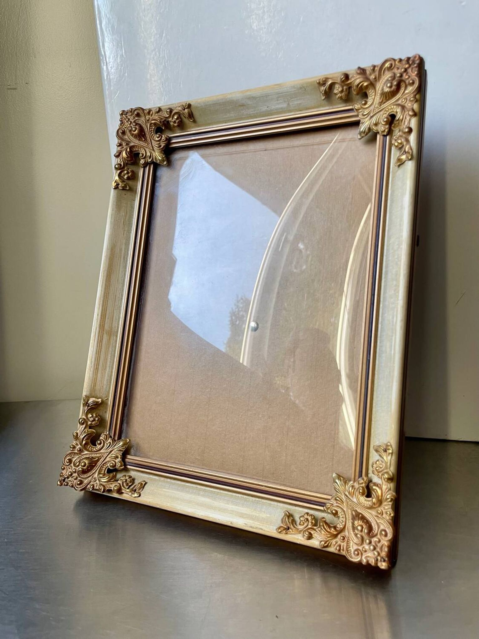 Antique wooden frame with metal gold colored details 28 cm x 22 cm convex glass