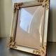 Antique wooden frame with metal gold colored details 28 cm x 22 cm convex glass