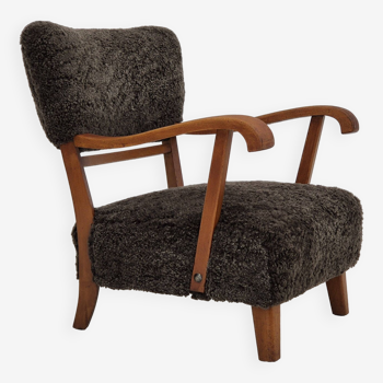 1950s, Danish design, refurbished-reupholstered armchair, genuine sheepskin.