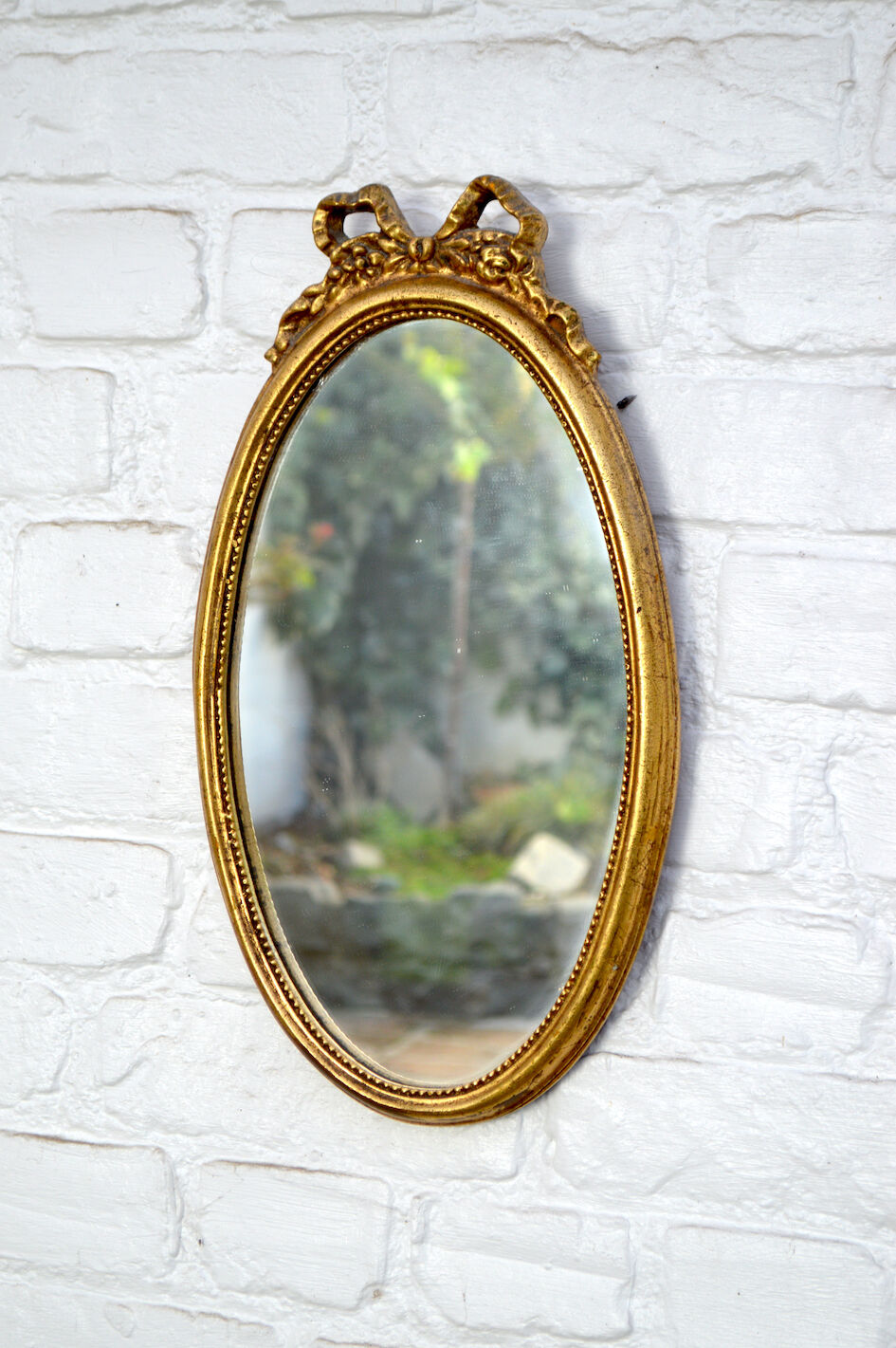 Golden ribbon mirror