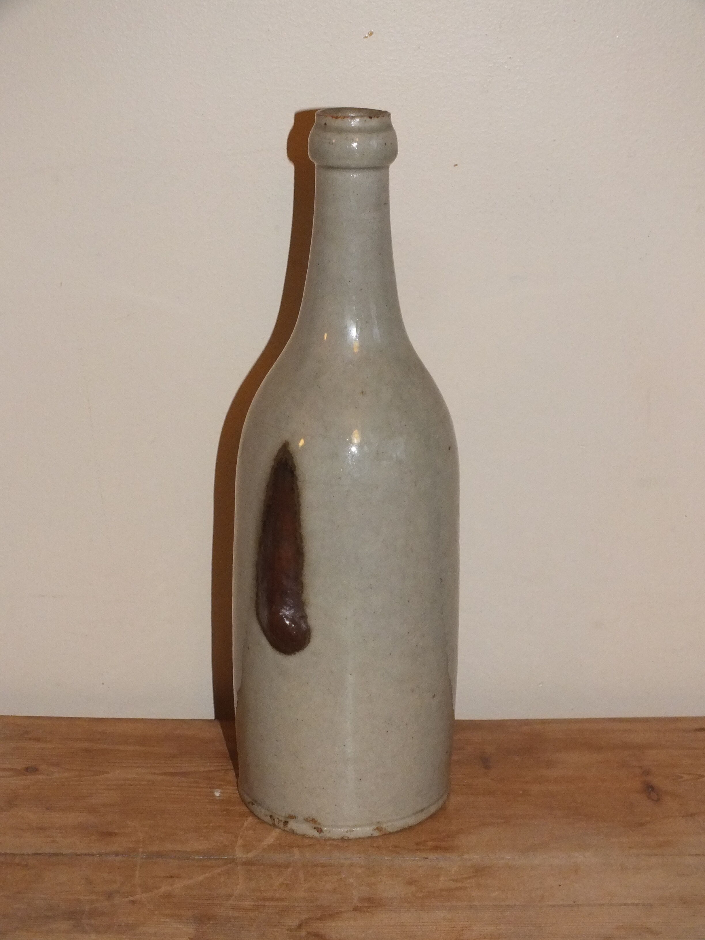 Old bottle in glazed clay of Saône et Loire