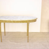 Oval coffee table in marble and brass