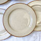 6 flat plates in speckled beige sandstone