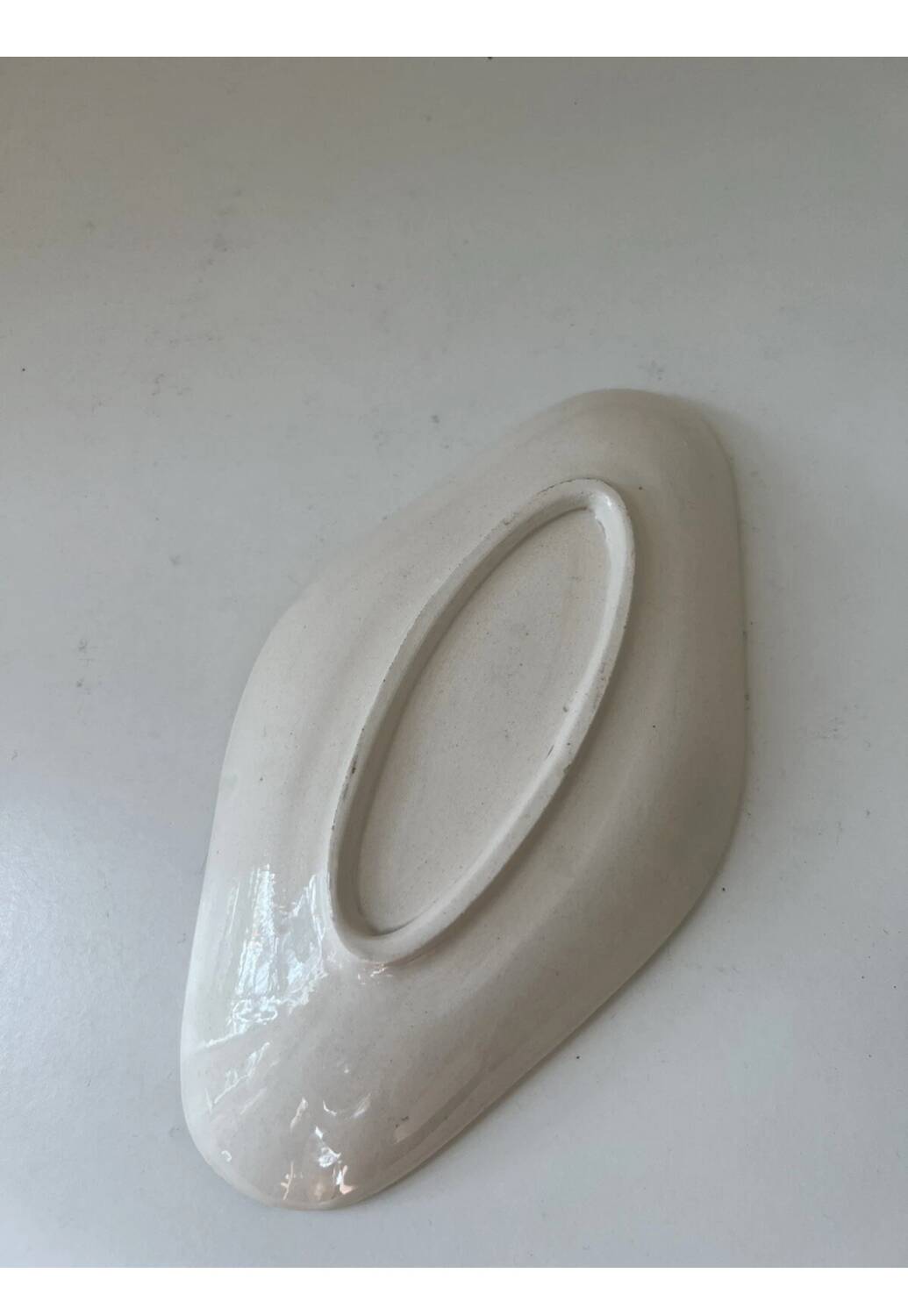 Antique Terre de Fer dish with carnation decoration from Clairefontaine