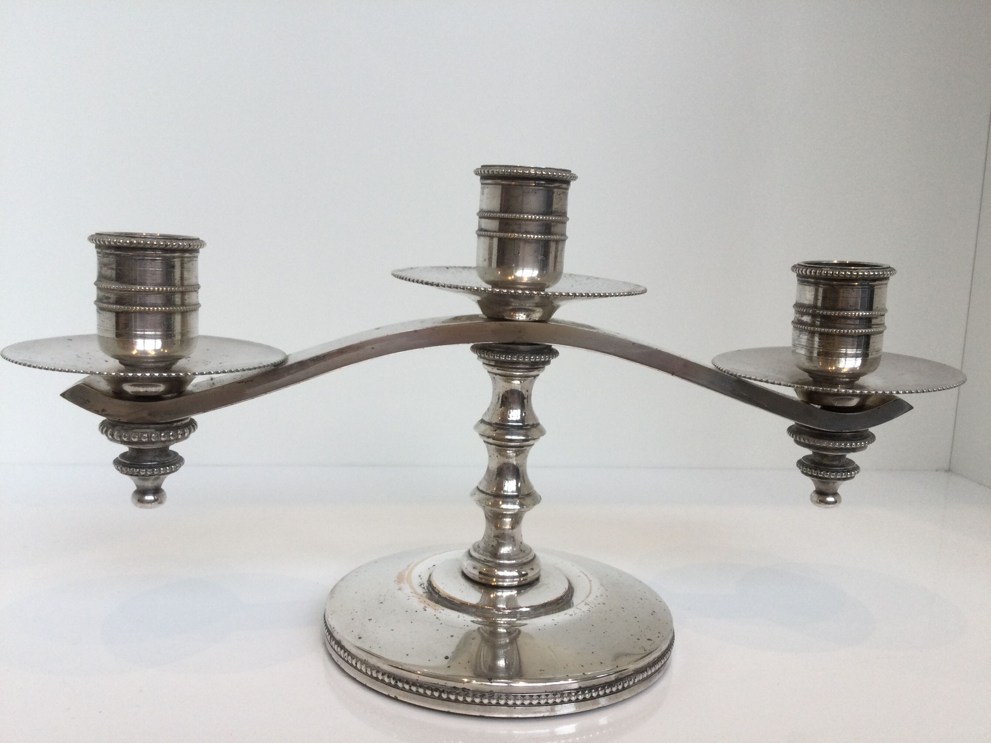 Candle holders or candlesticks made of silver metal