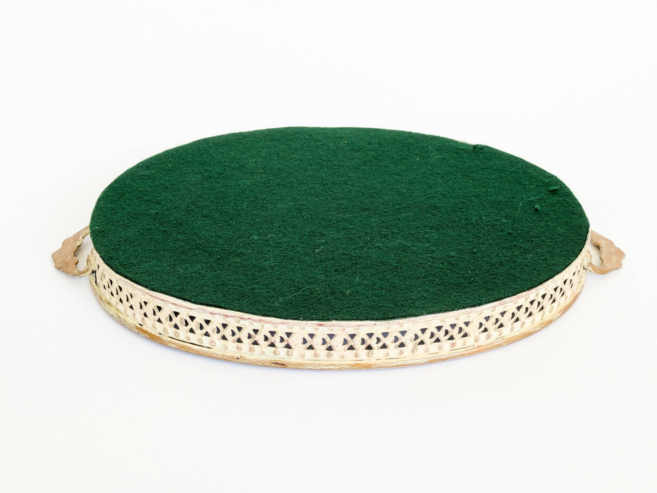 Oval metal decorative vintage tray with floral pattern.