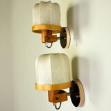 Pair of articulated "Cocoon" wall lights, resin and pine, Italy, 1970s