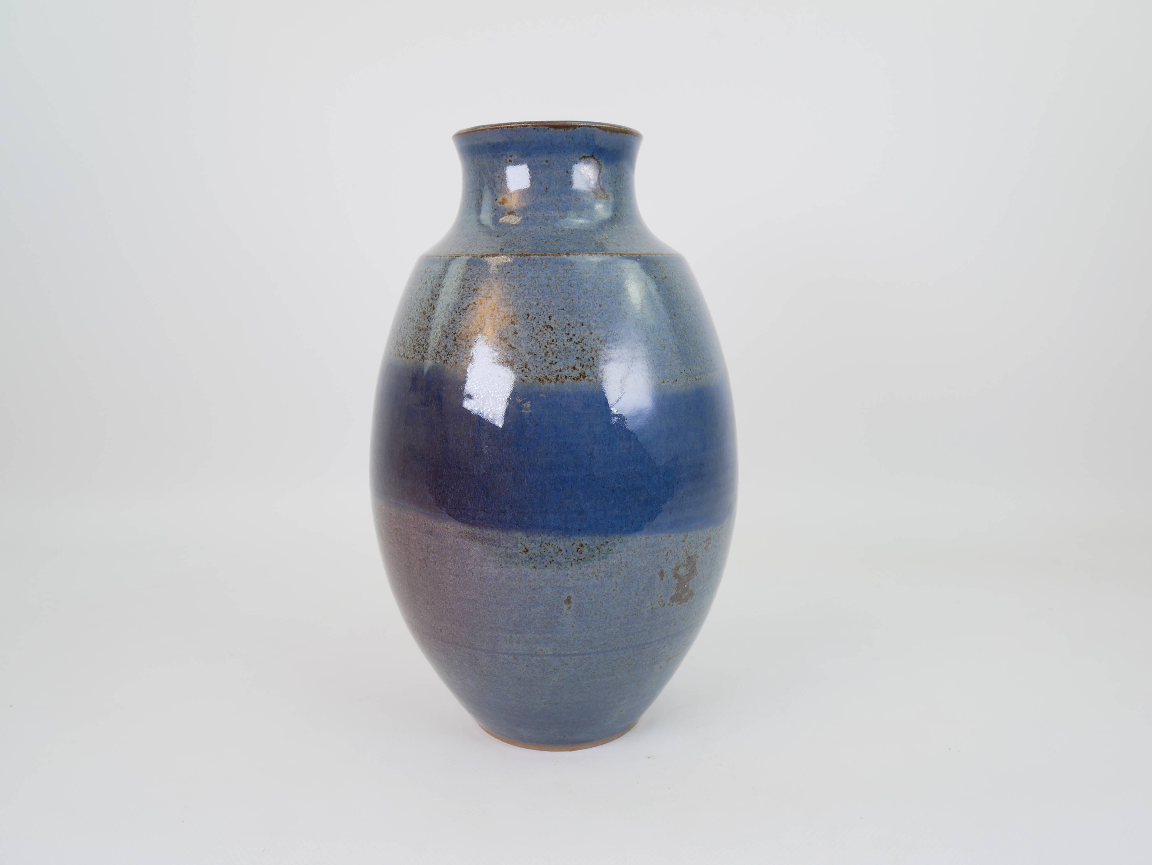Large blue glazed ceramic vase signed under the base