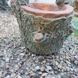 Medici stone planter with tree trunk decor