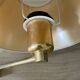 Pair of vintage brass wall lights with adjustable arms.