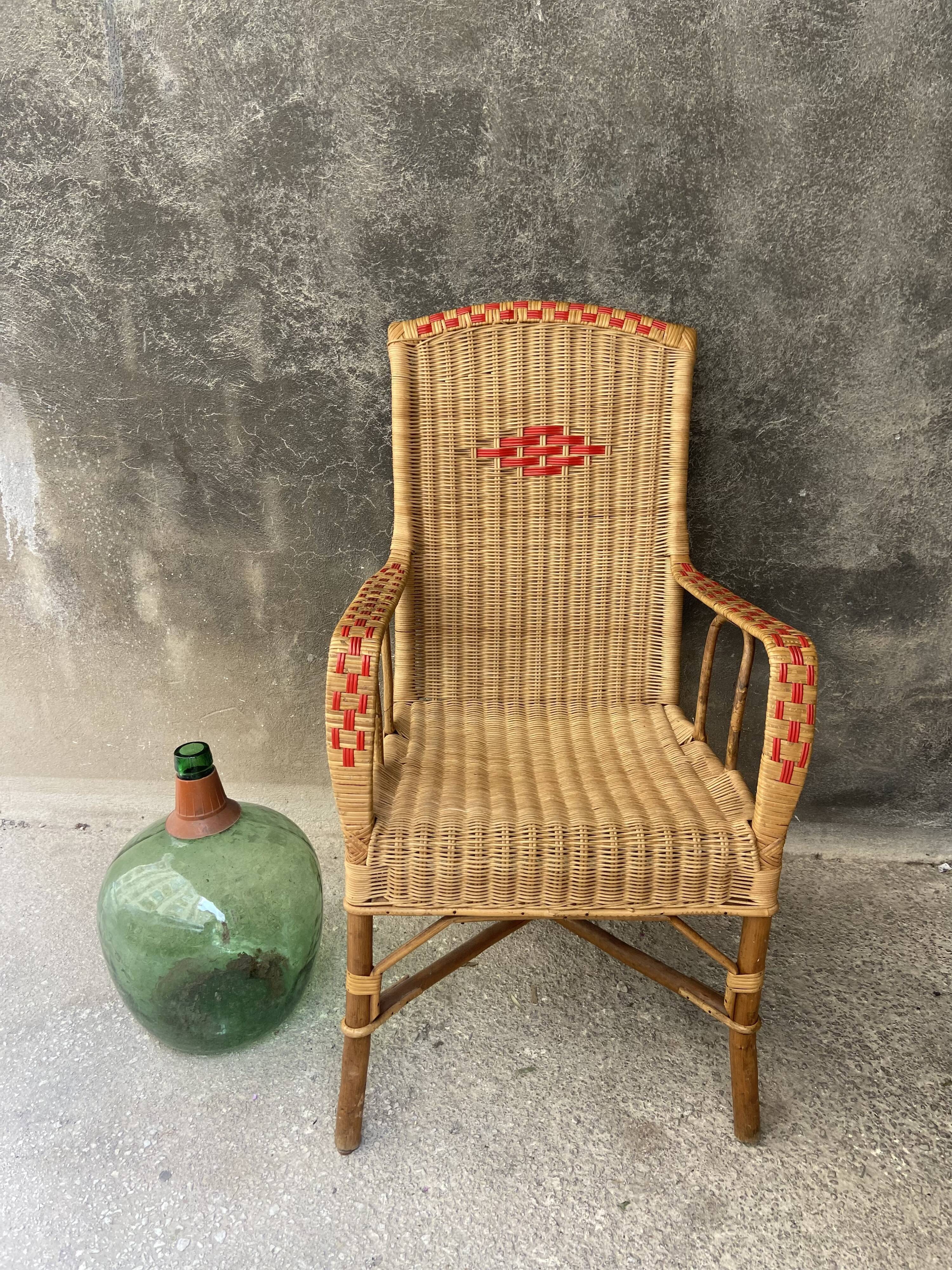 Vintage braided rattan armchair