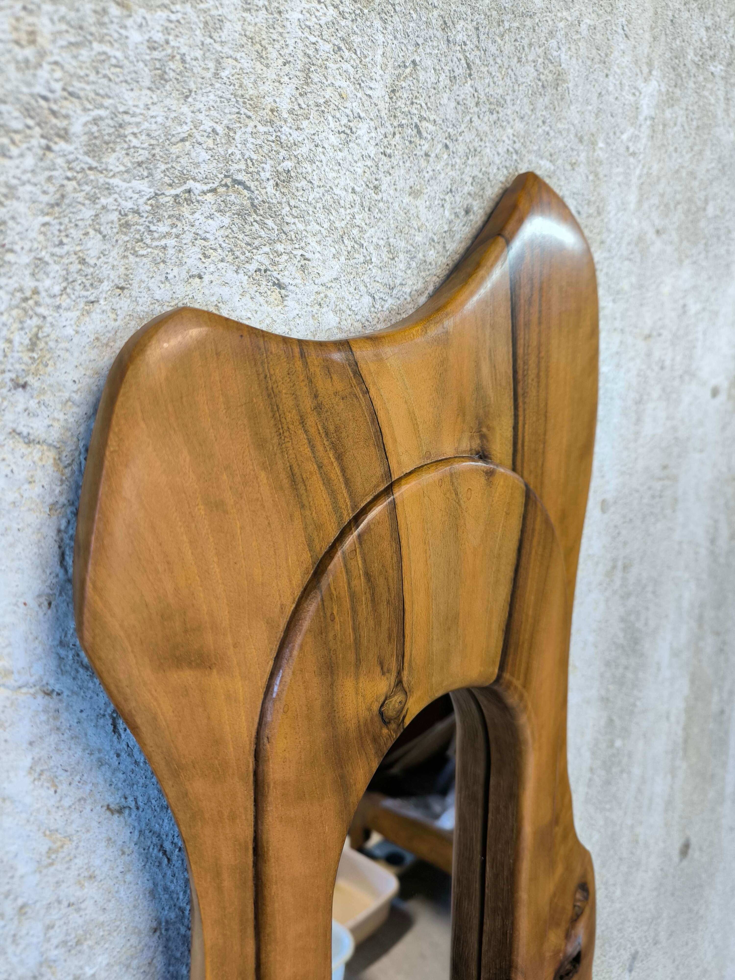 Vintage free-form mirror in solid wood.