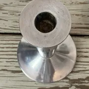 Pair of minimalist polished aluminium candle holders