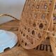 Openwork rattan suspension