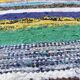 Vintage traditional nomadic kilim ethnic rug with multicoloured stripes.