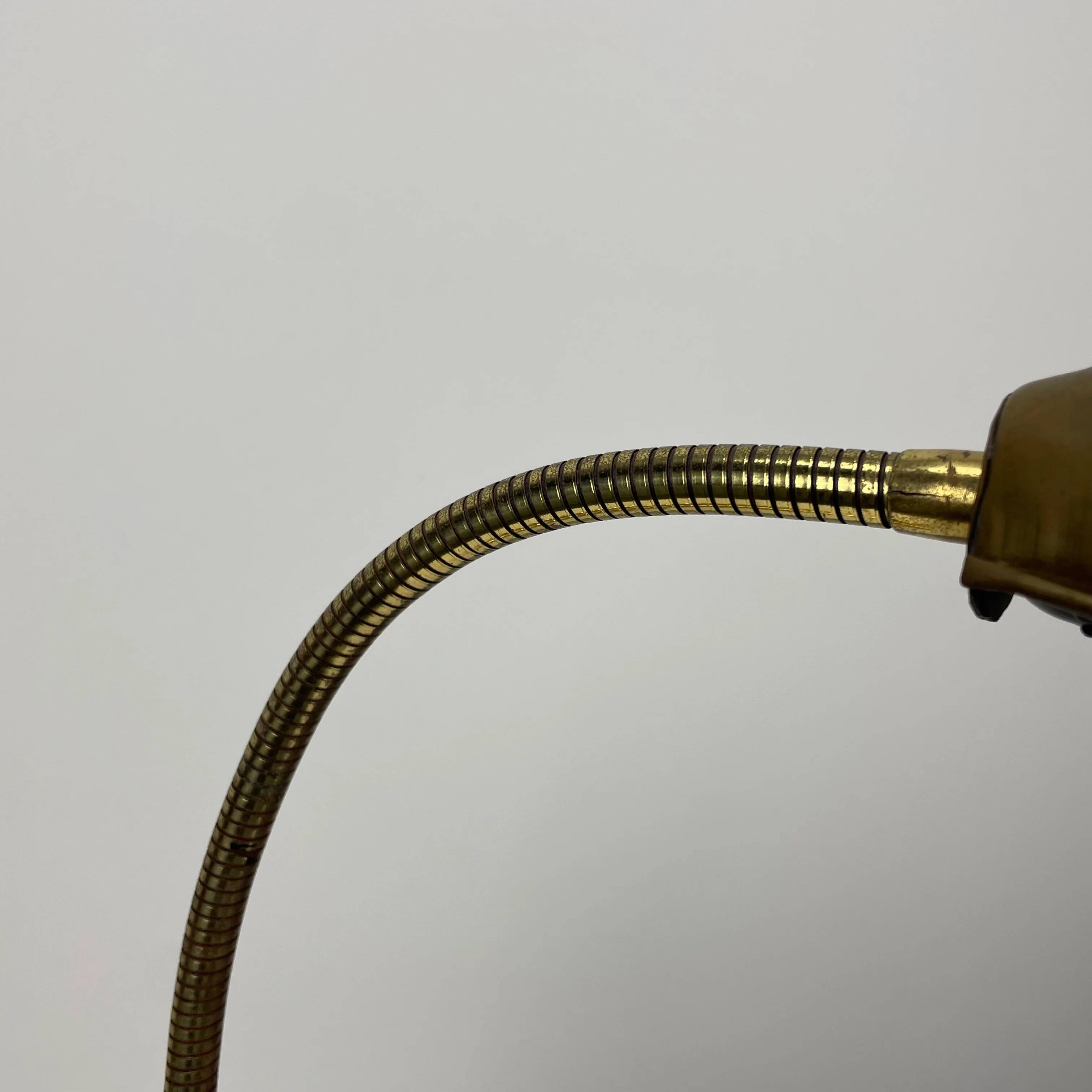 French table lamp in brass with a shell-shaped shade from the 1950s.
