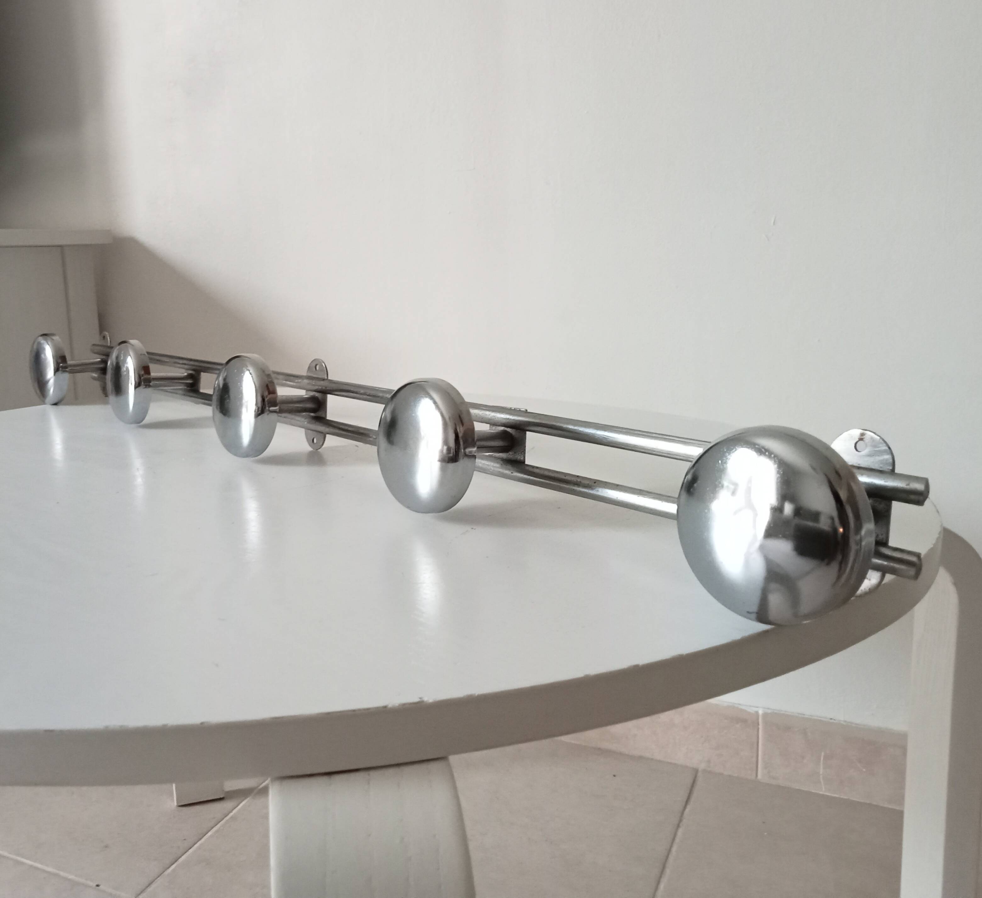 Vintage chrome wall-mounted coat rack from the 1970s
