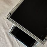 Modernist serving trolley in chromed metal and black smoked glass