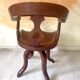Fauteuil de marin en teck pivotant