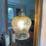 Baladeuse avec globe vintage en verre ambré