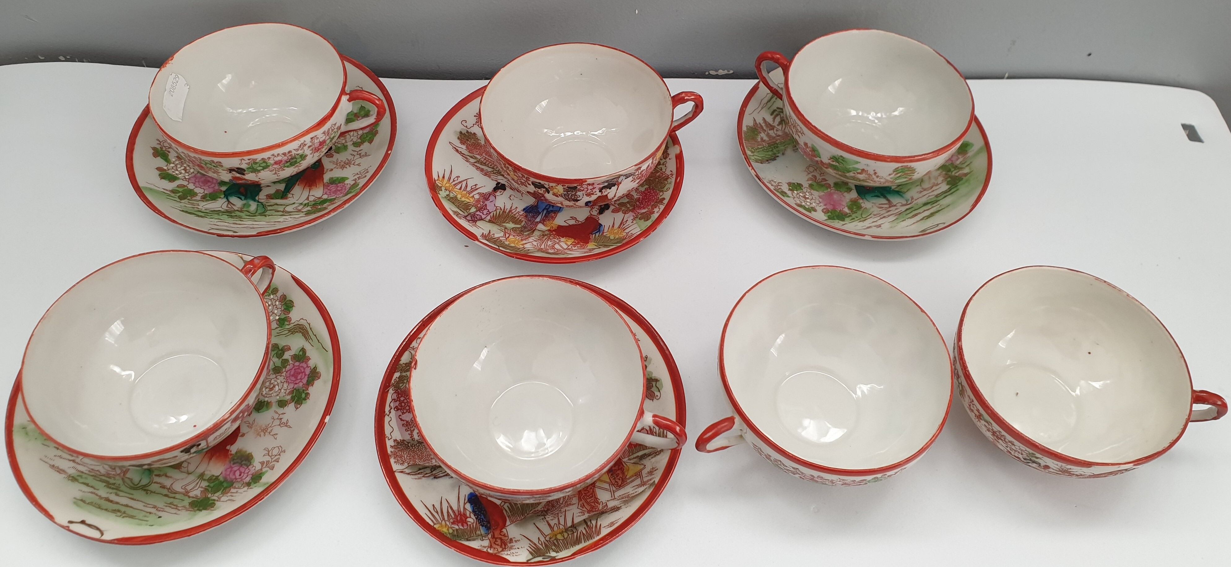 Set of seven tea cups and five sub-cups made of Japanese porcelain