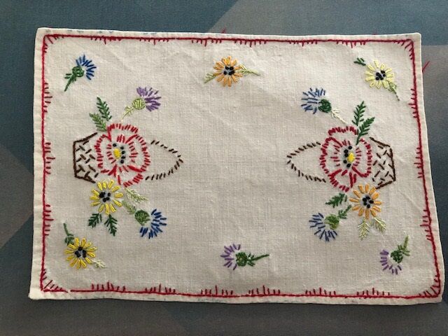Two hand-embroidered placemats 30x20cm