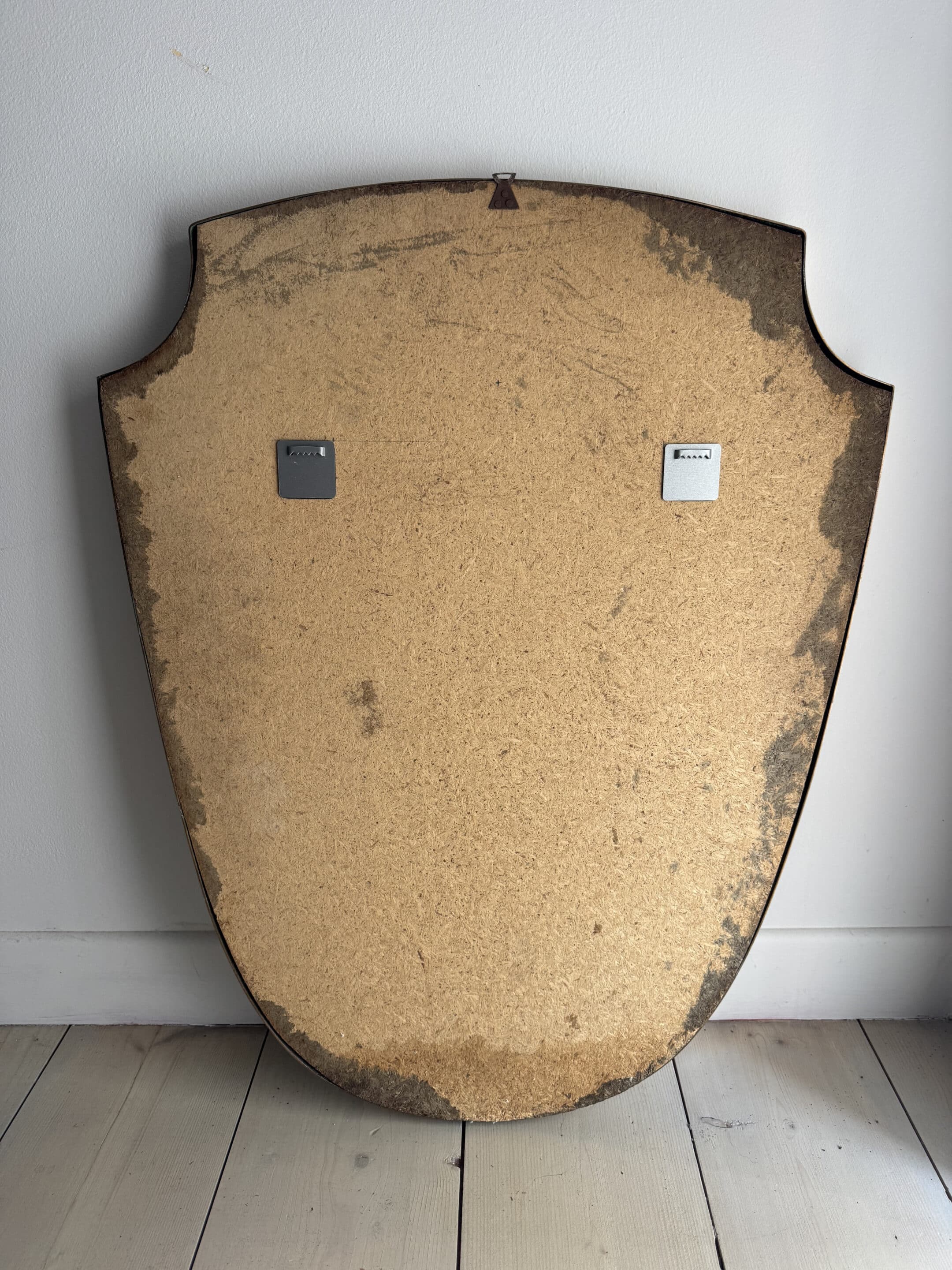 Brass mirror with crest, bead frieze, Italian design style.