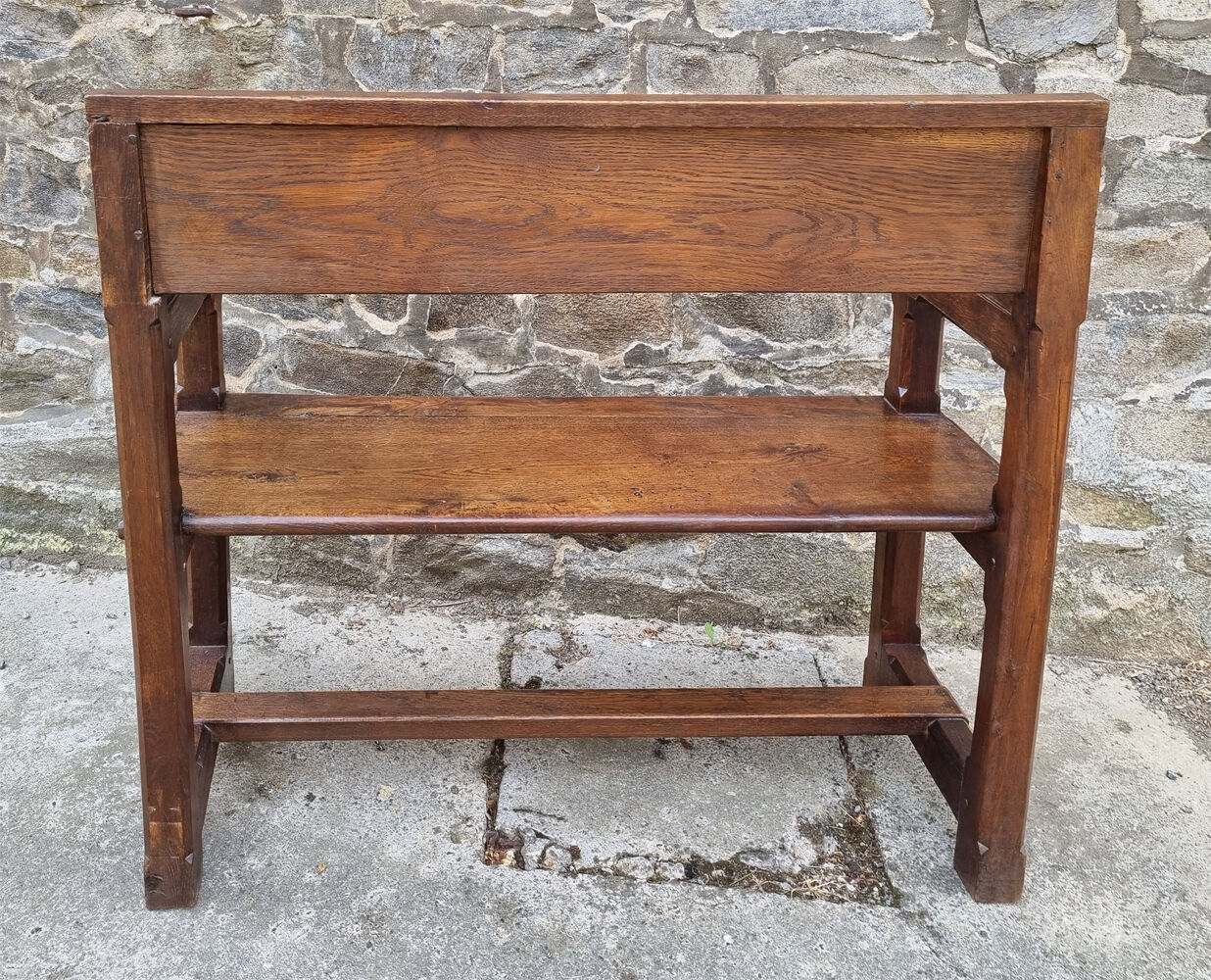 Stylized church pew, early twentieth century, solid wood