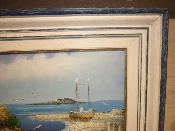 Huile sur toile d’un bateau sur l’estran signée Yann 55X45