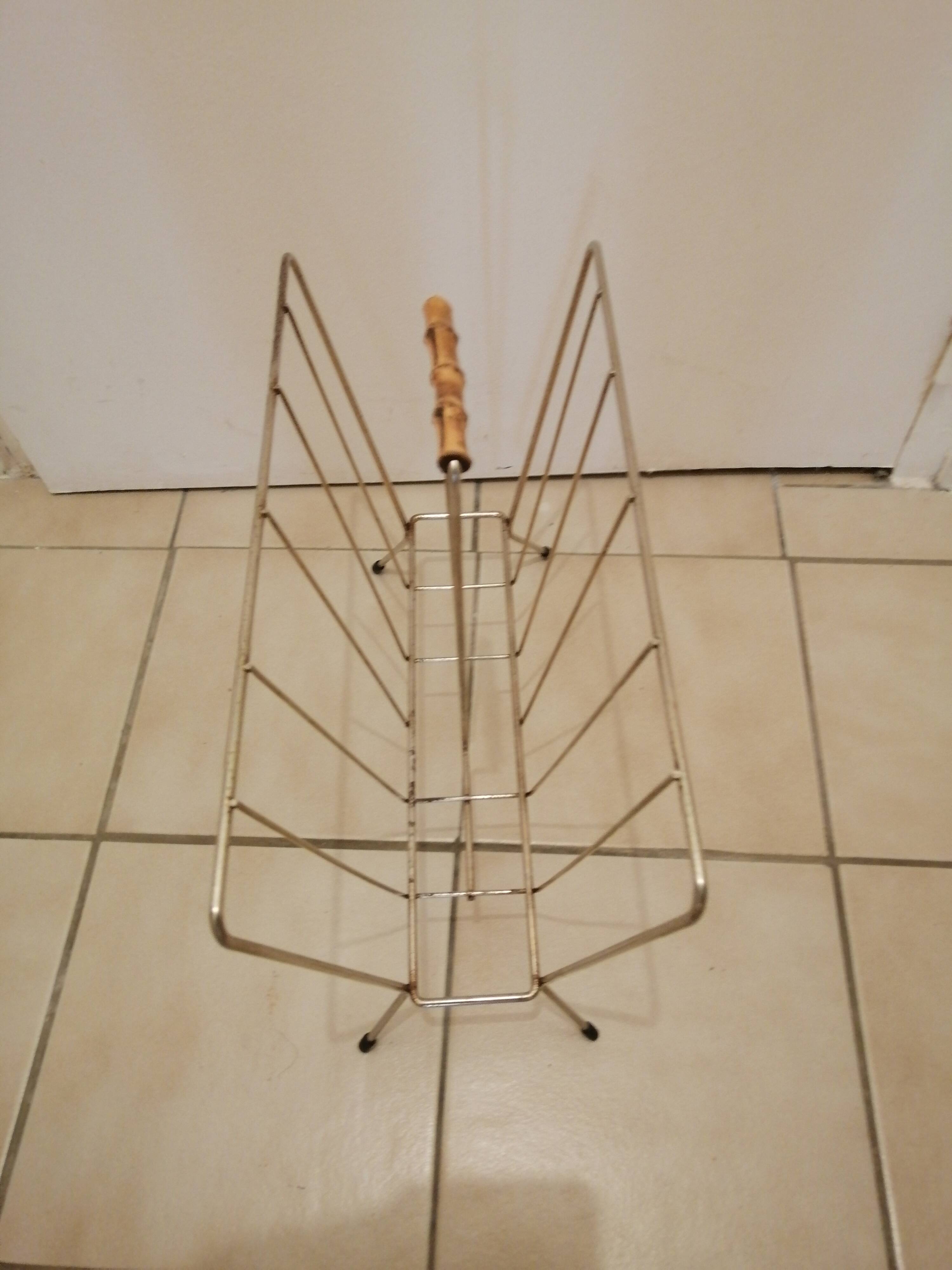 Vintage magazine holder in gold metal