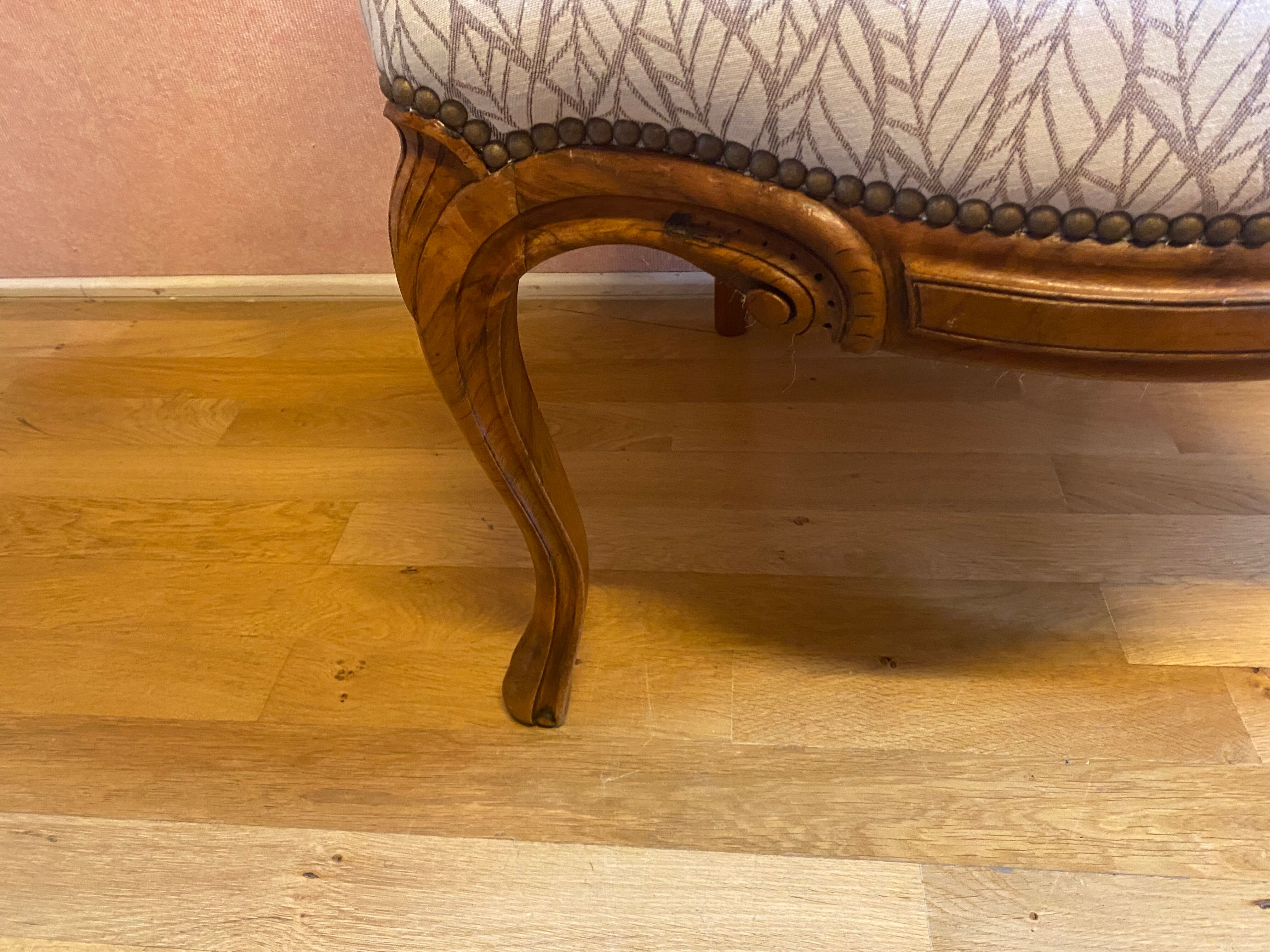 office armchair in walnut, nineteenth century, fully trimmed and reupholstered.