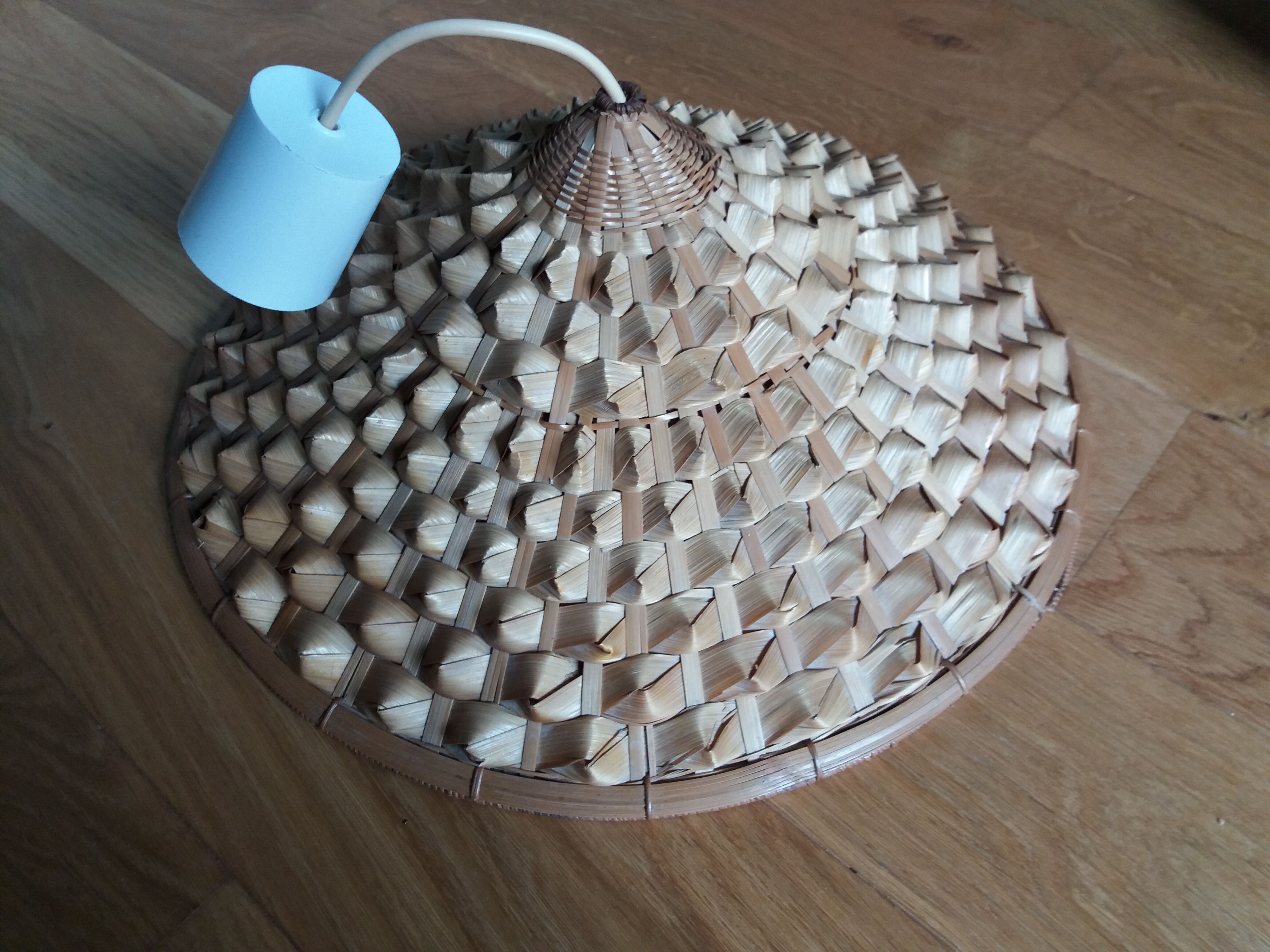 Conical shaped rattan suspension