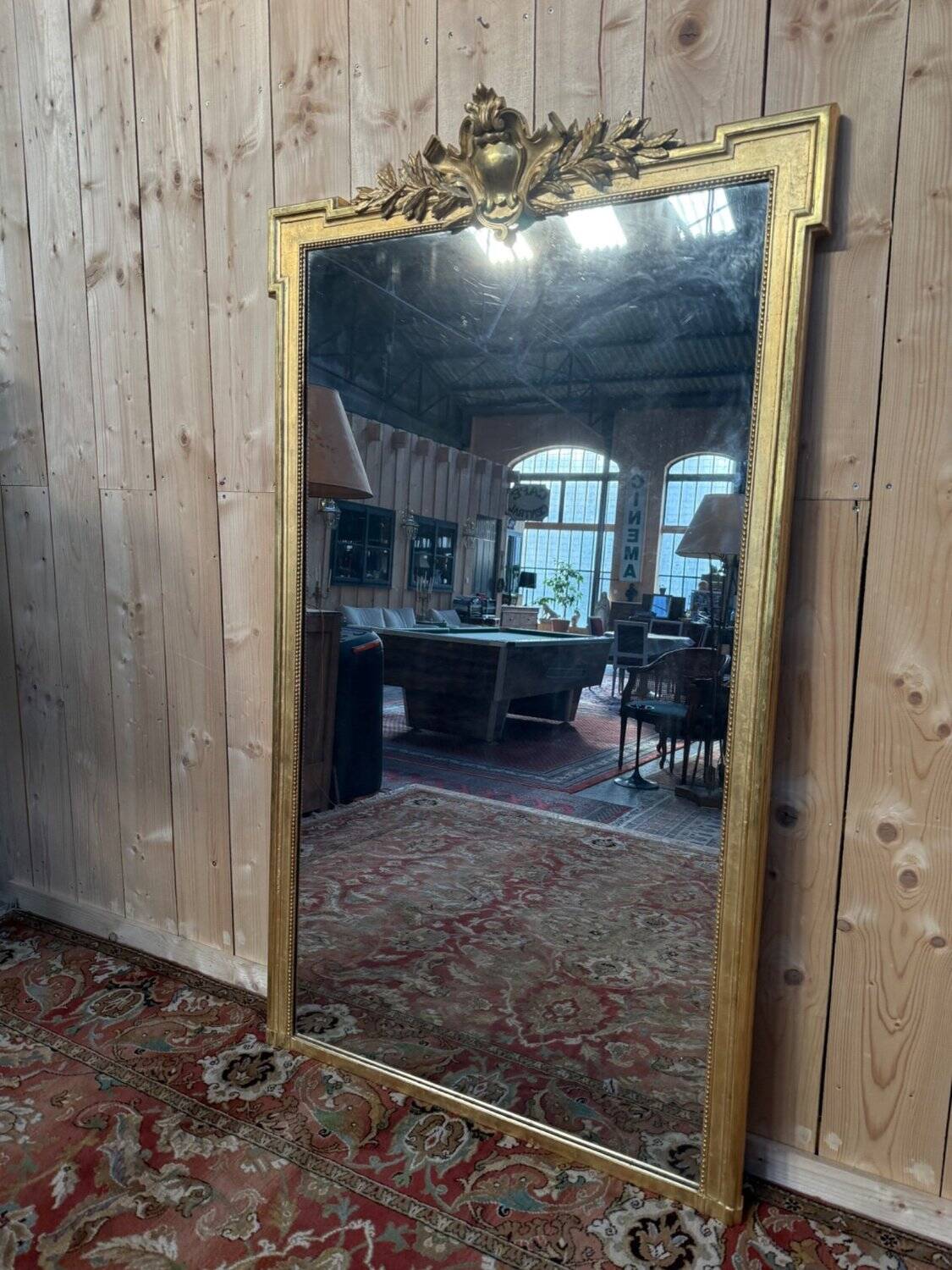 Louis XVI style gilded wood pediment mirror