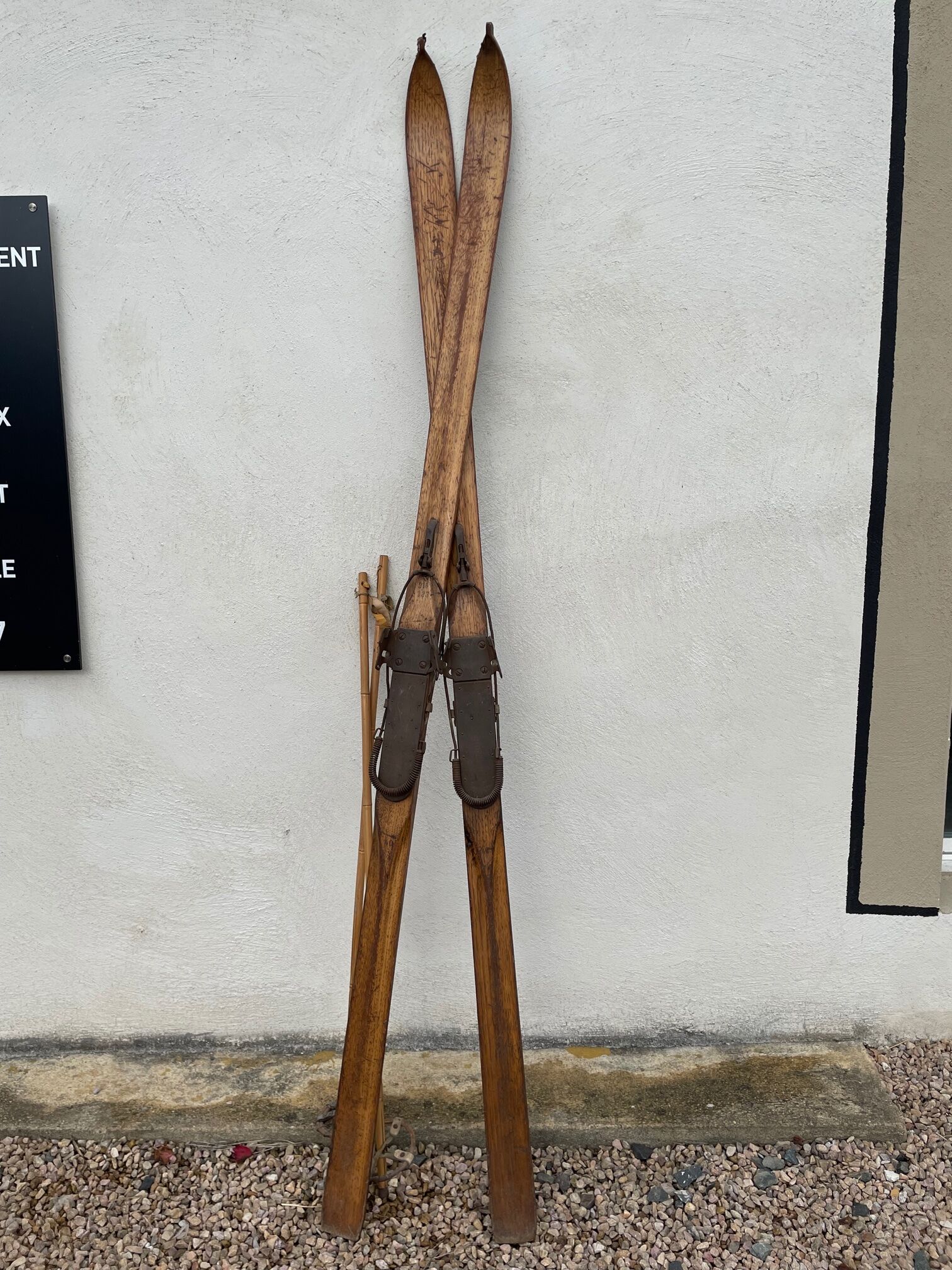 Wooden ski and its sticks