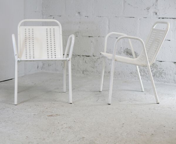 Paire de fauteuils en acier alvéolé France circa 1950