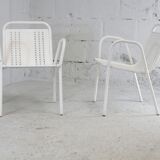 Pair of honeycomb steel armchairs. France, circa 1950.