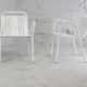 Pair of honeycomb steel armchairs. France, circa 1950.