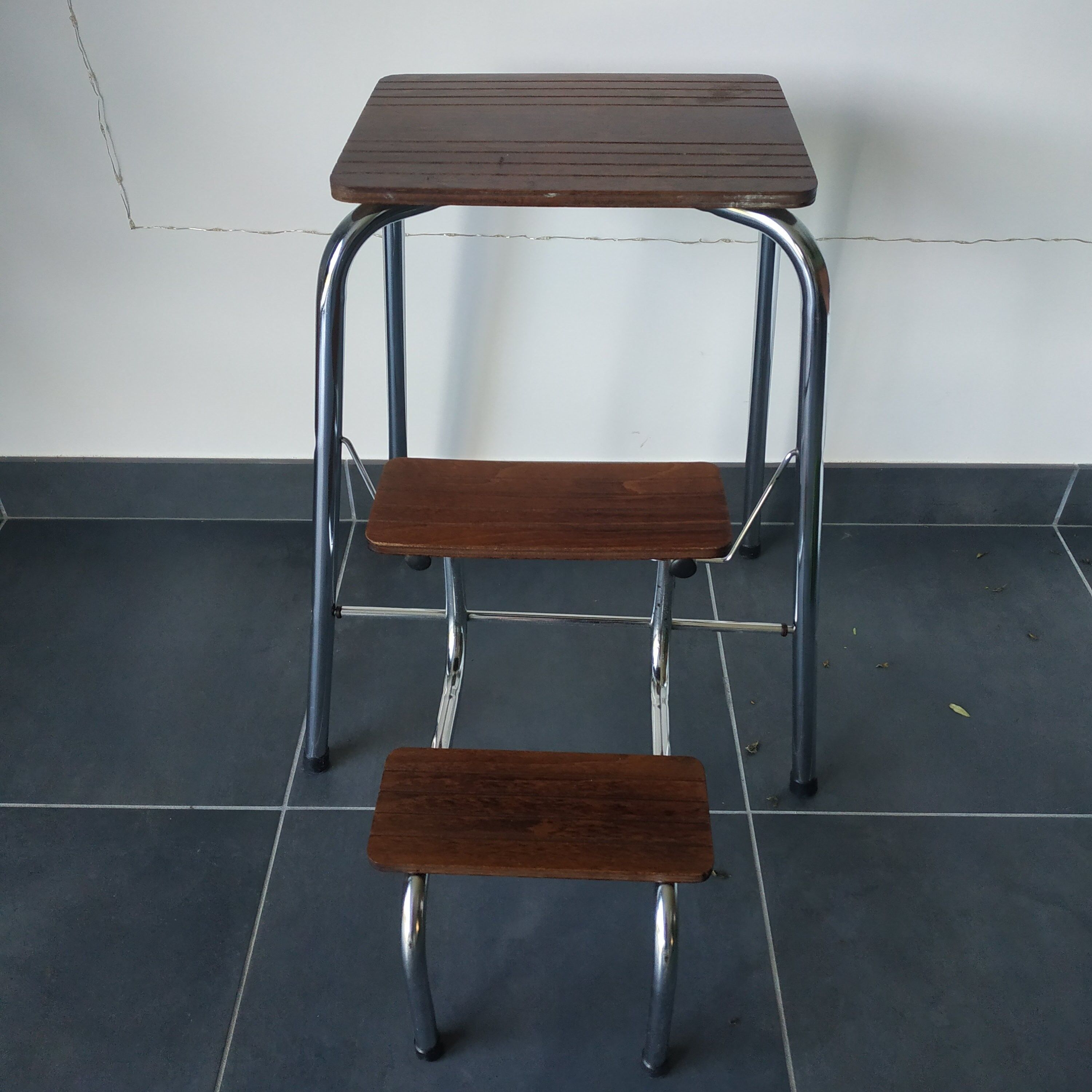 Old retractable wooden stepladder