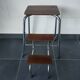 Old retractable wooden stepladder