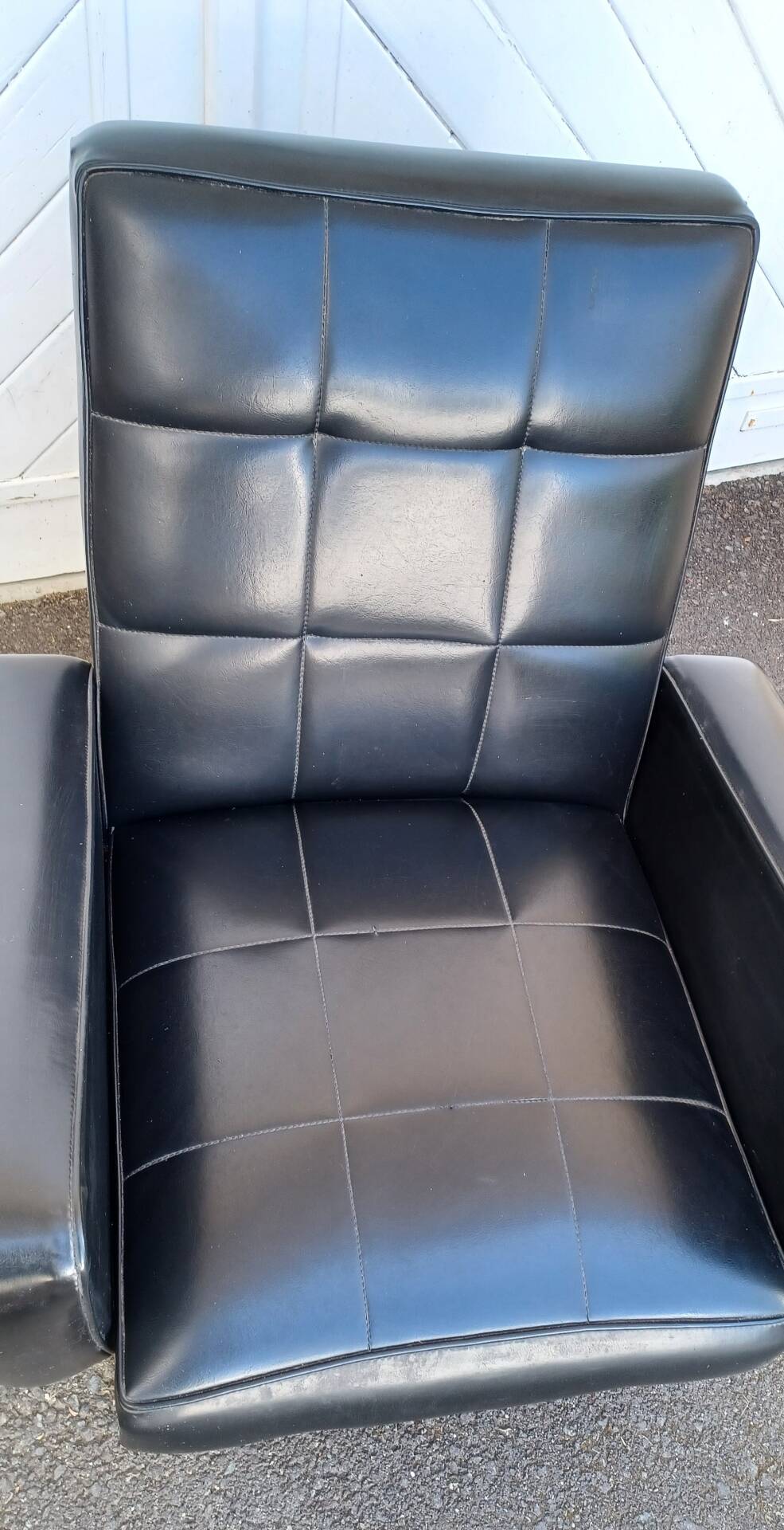 Black faux leather armchair from the 1960s