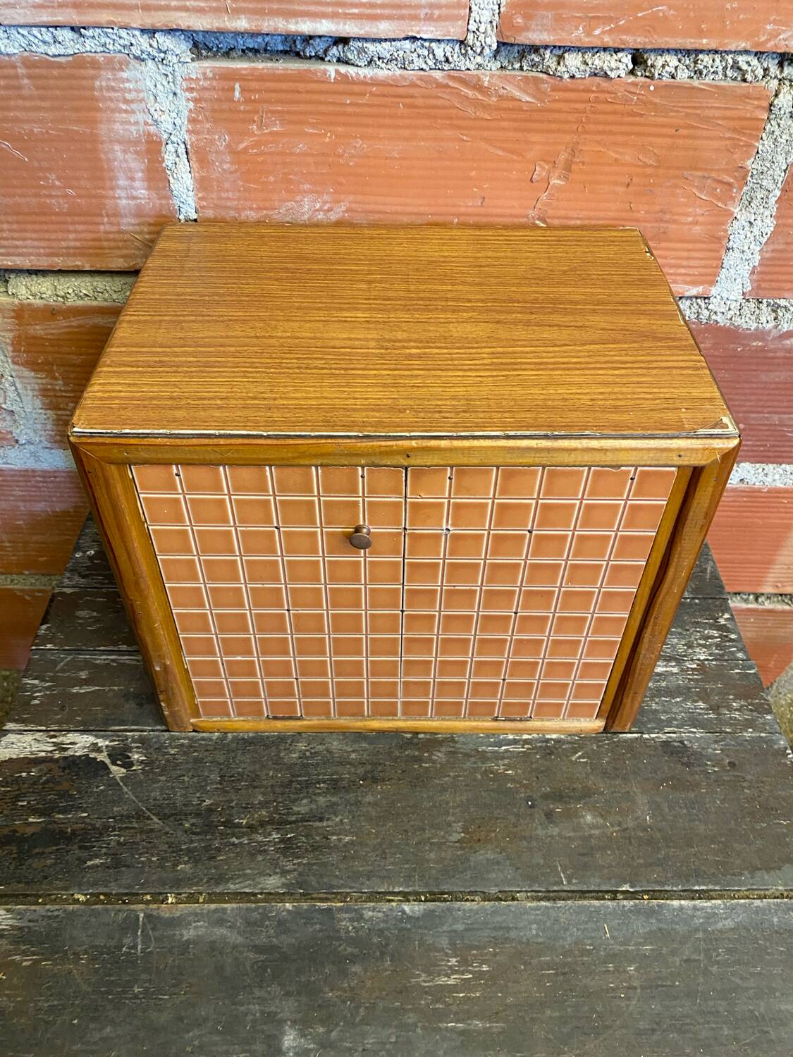 Vintage wooden storage cabinet with shelves