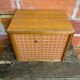 Vintage wooden storage cabinet with shelves