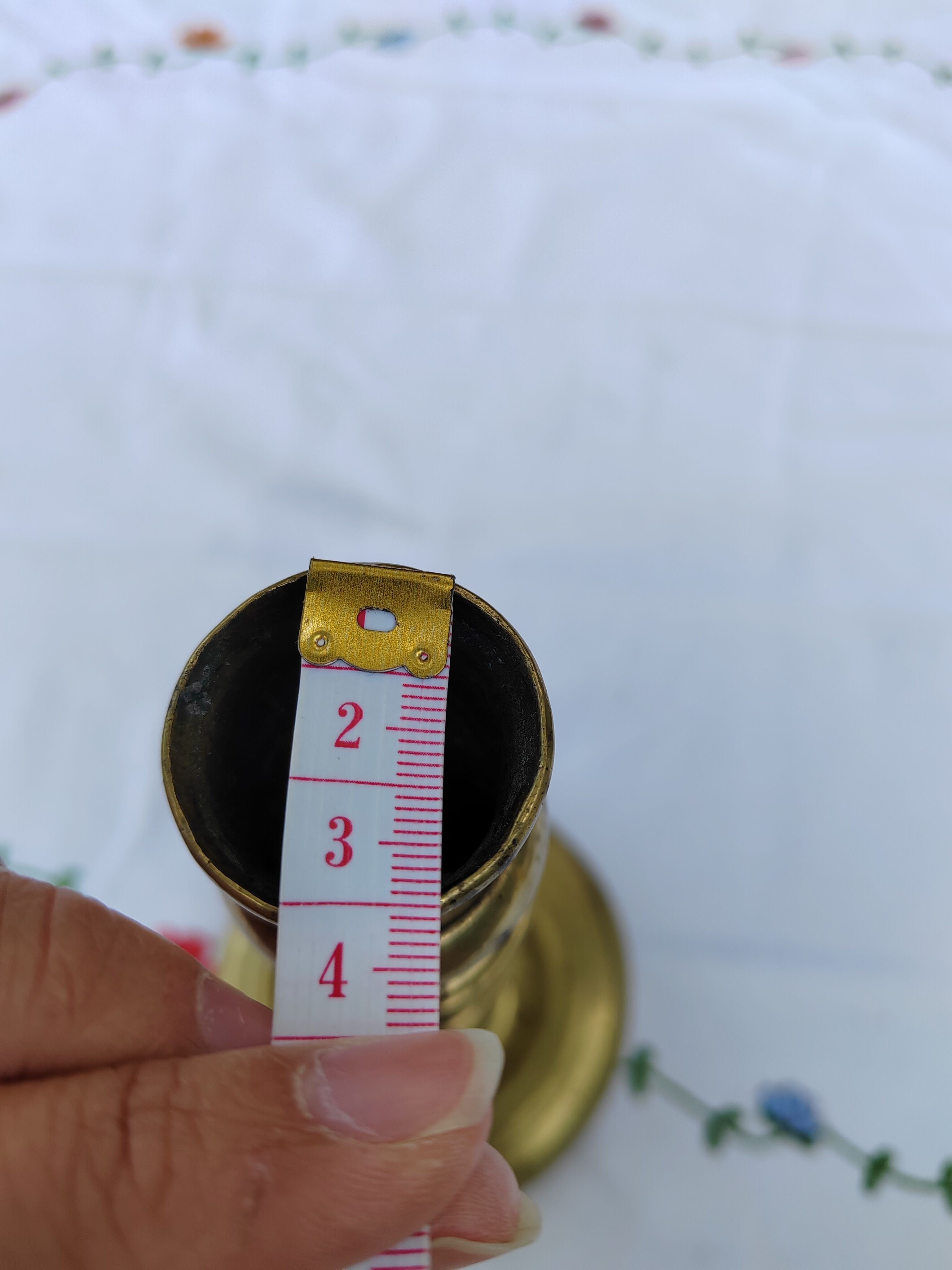 Golden brass candle holder