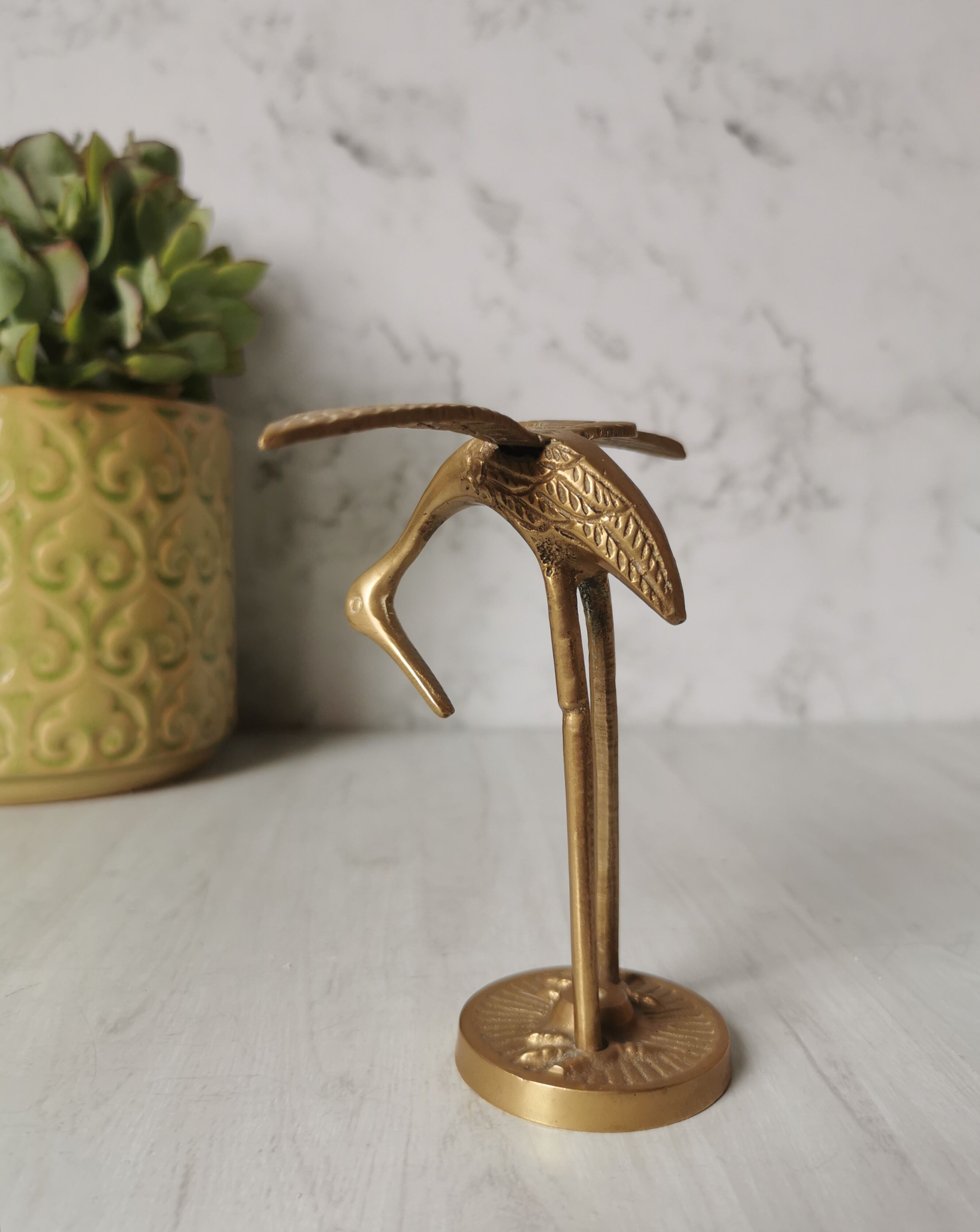 Brass heron