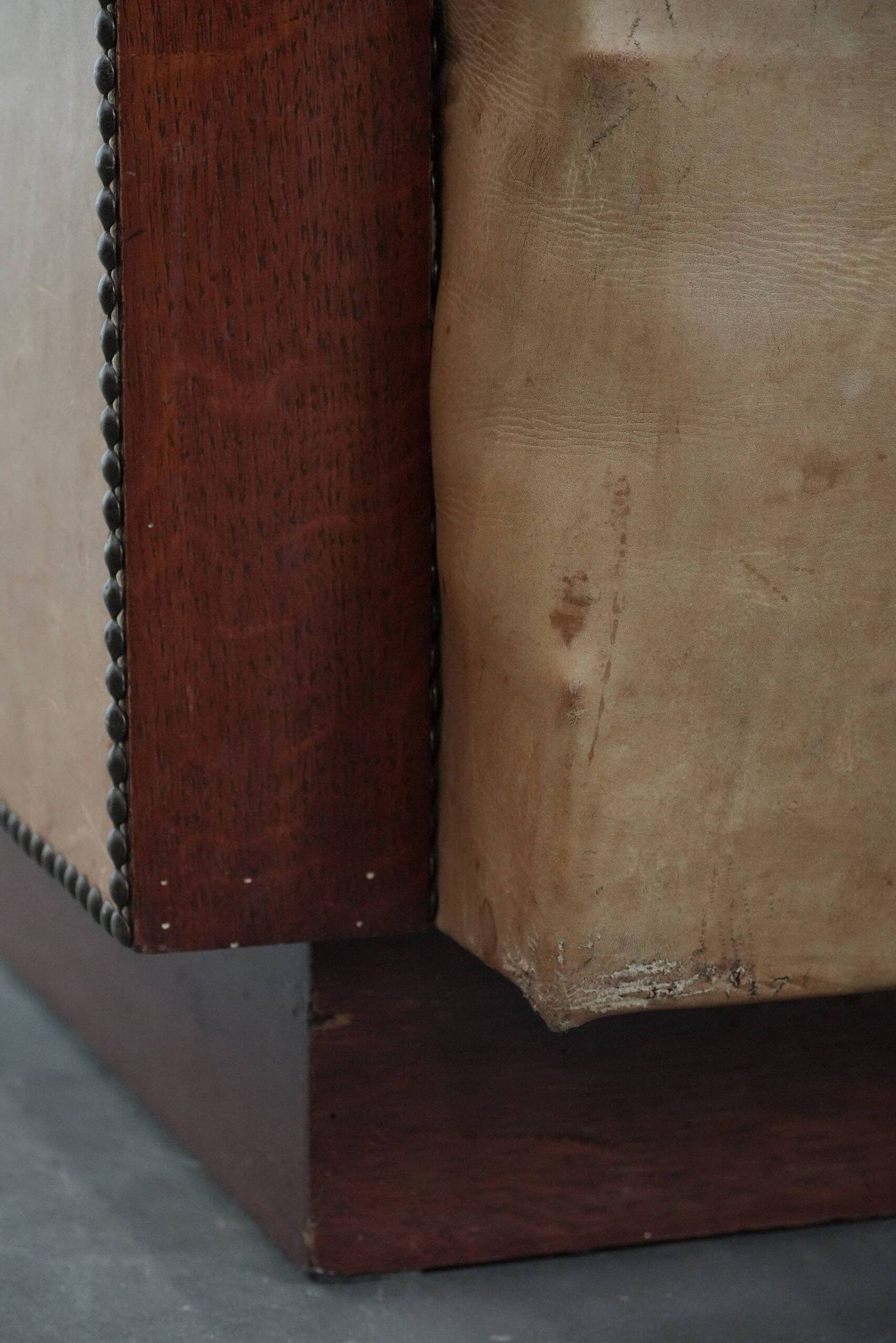 Art Deco design armchair in light cognac cowhide leather.