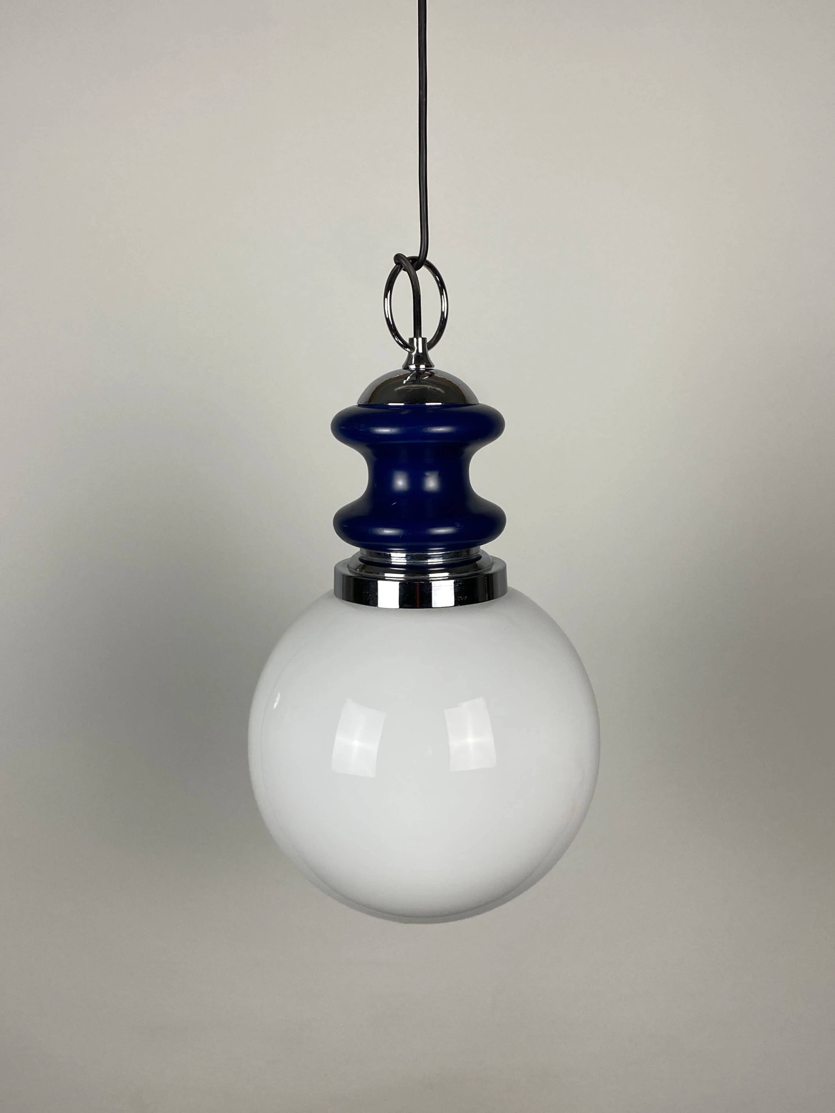 Vintage glass sphere with blue metal pendant from the 1970s.